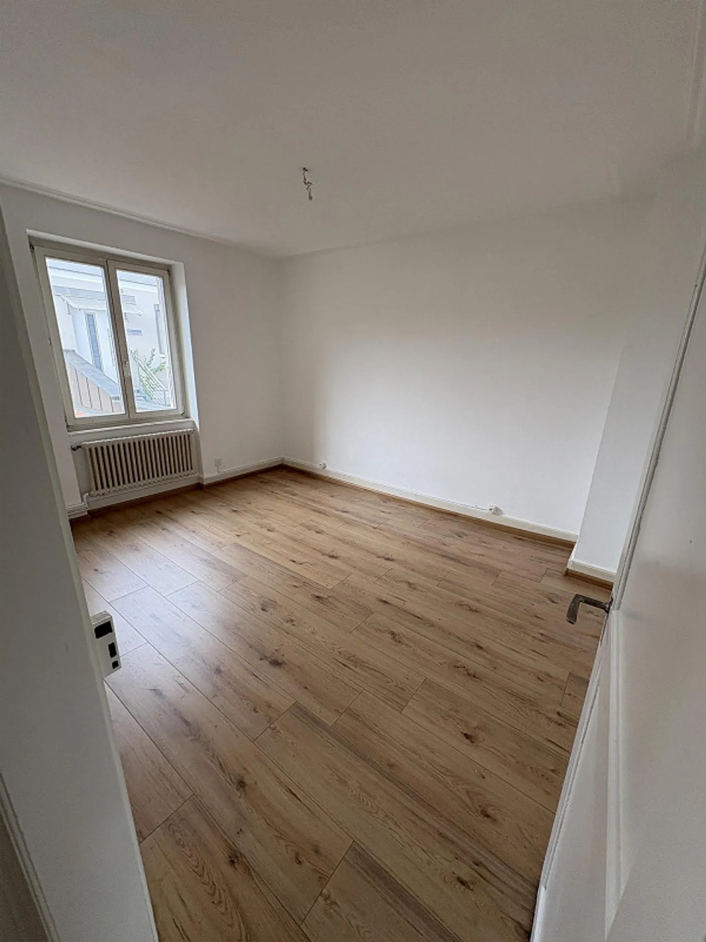 Appartamento duplex 5.5 locali con balcone, giardino e posto auto - Foto 6 di 15