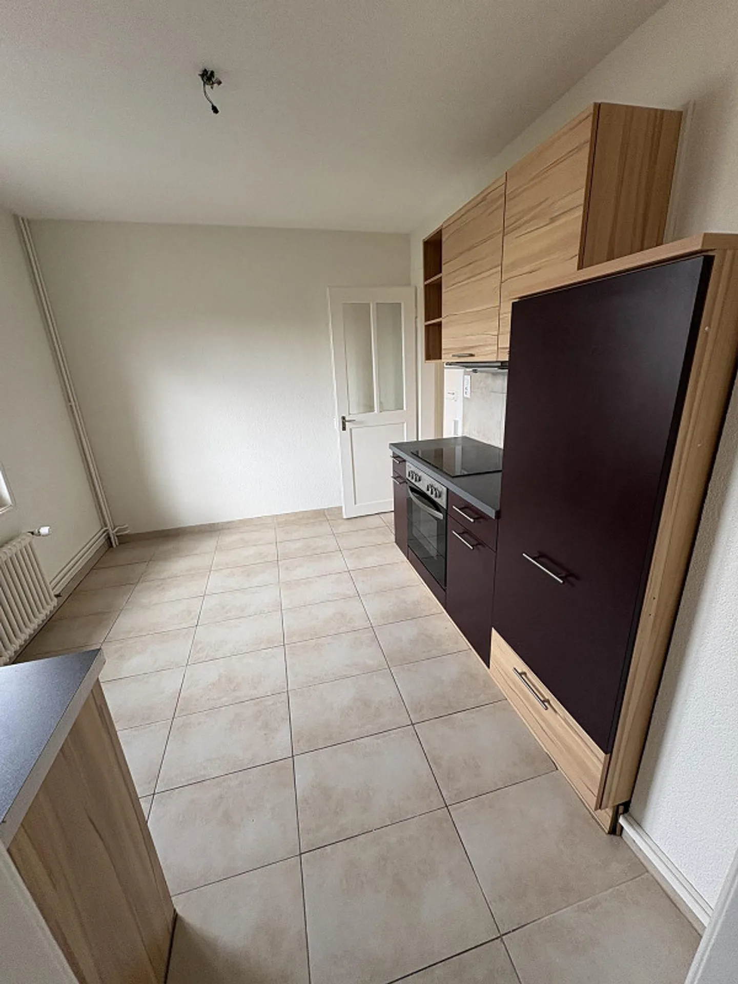 Appartamento duplex 5.5 locali con balcone, giardino e posto auto - Foto 7 di 15
