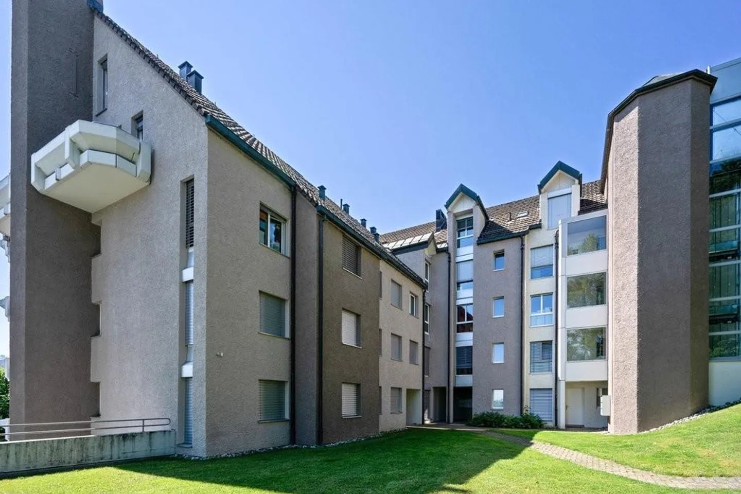 Comfortable living in a well-maintained apartment building - Photo 1 of 5