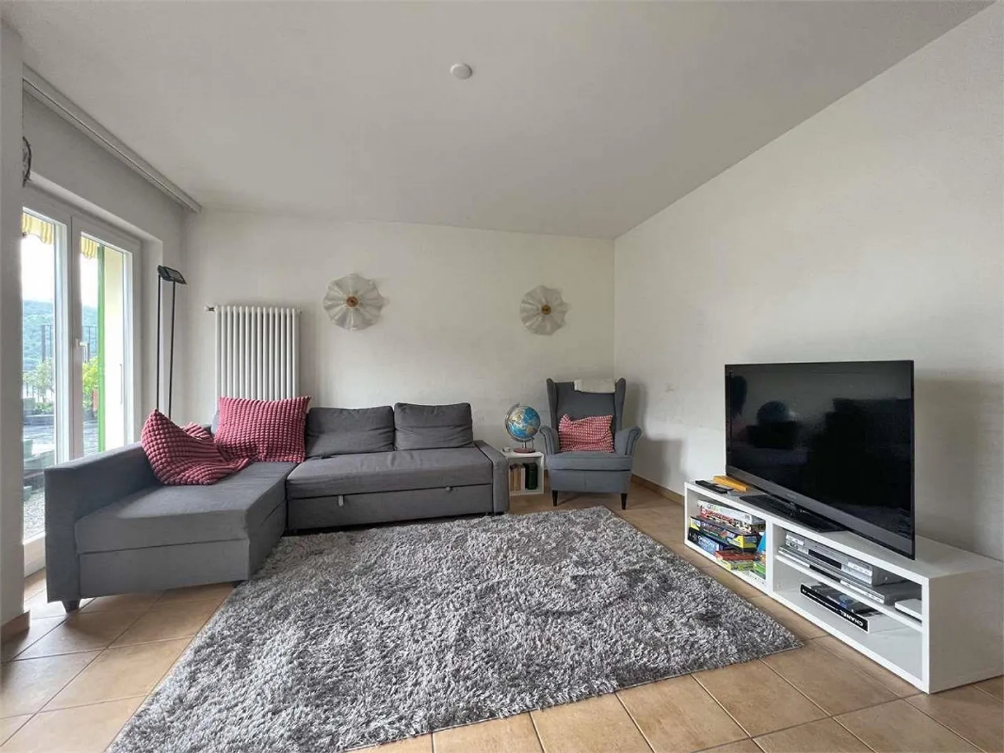Ampio attico di 6.5 locali vista lago a Melide - Foto 4 di 11