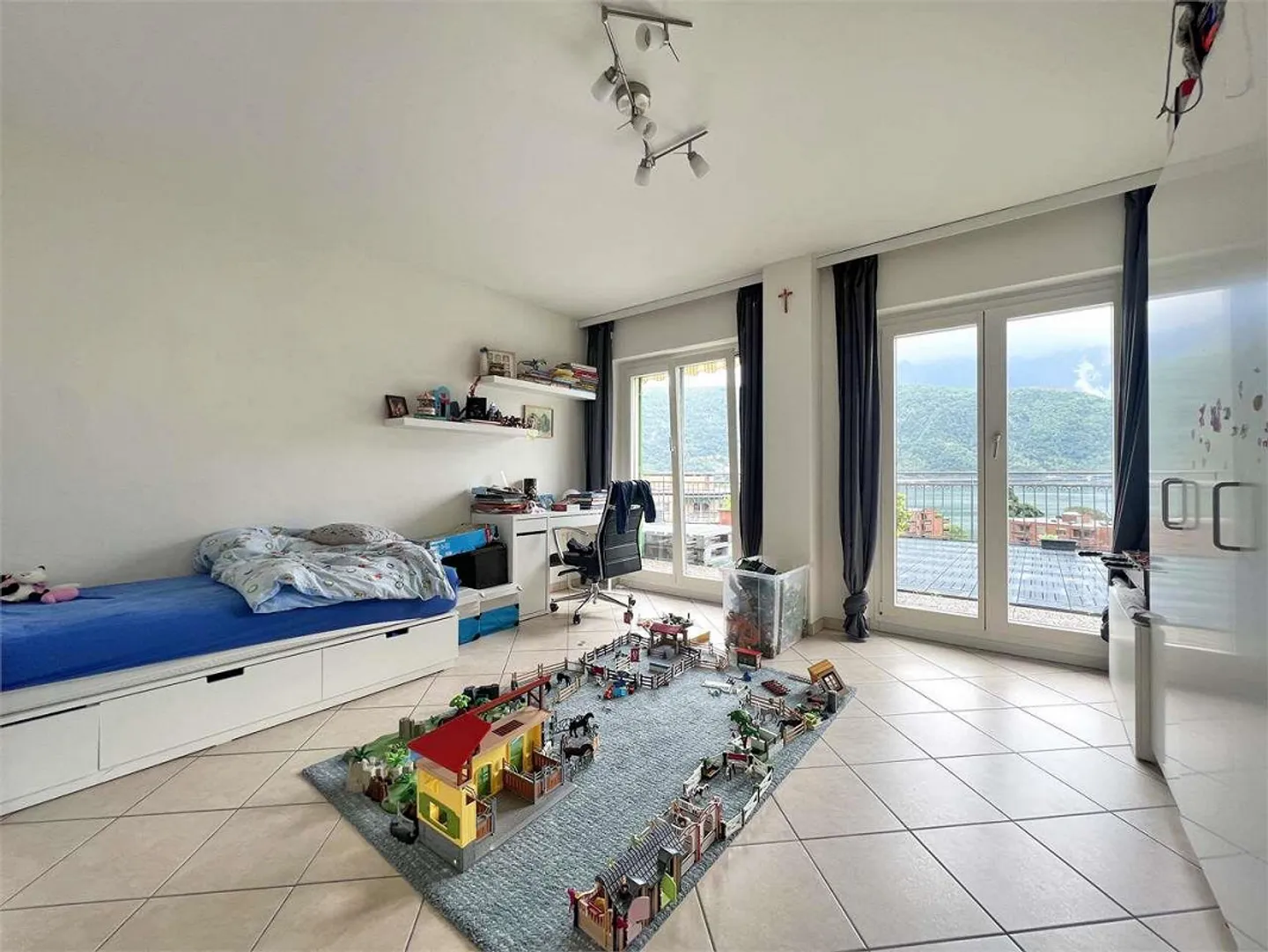 Ampio attico di 6.5 locali vista lago a Melide - Foto 5 di 11