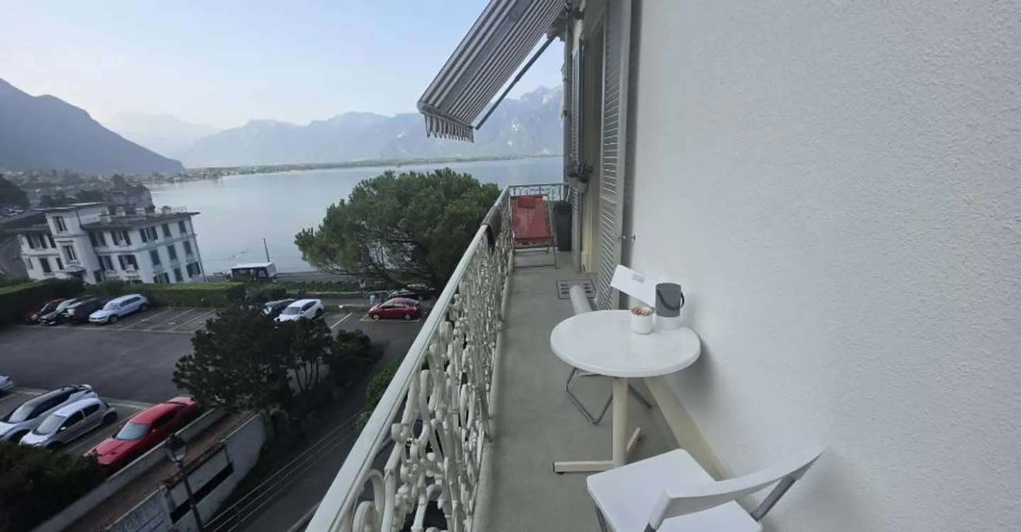 Appartement Charmant avec Vue sur le Lac - Photo 7 sur 15