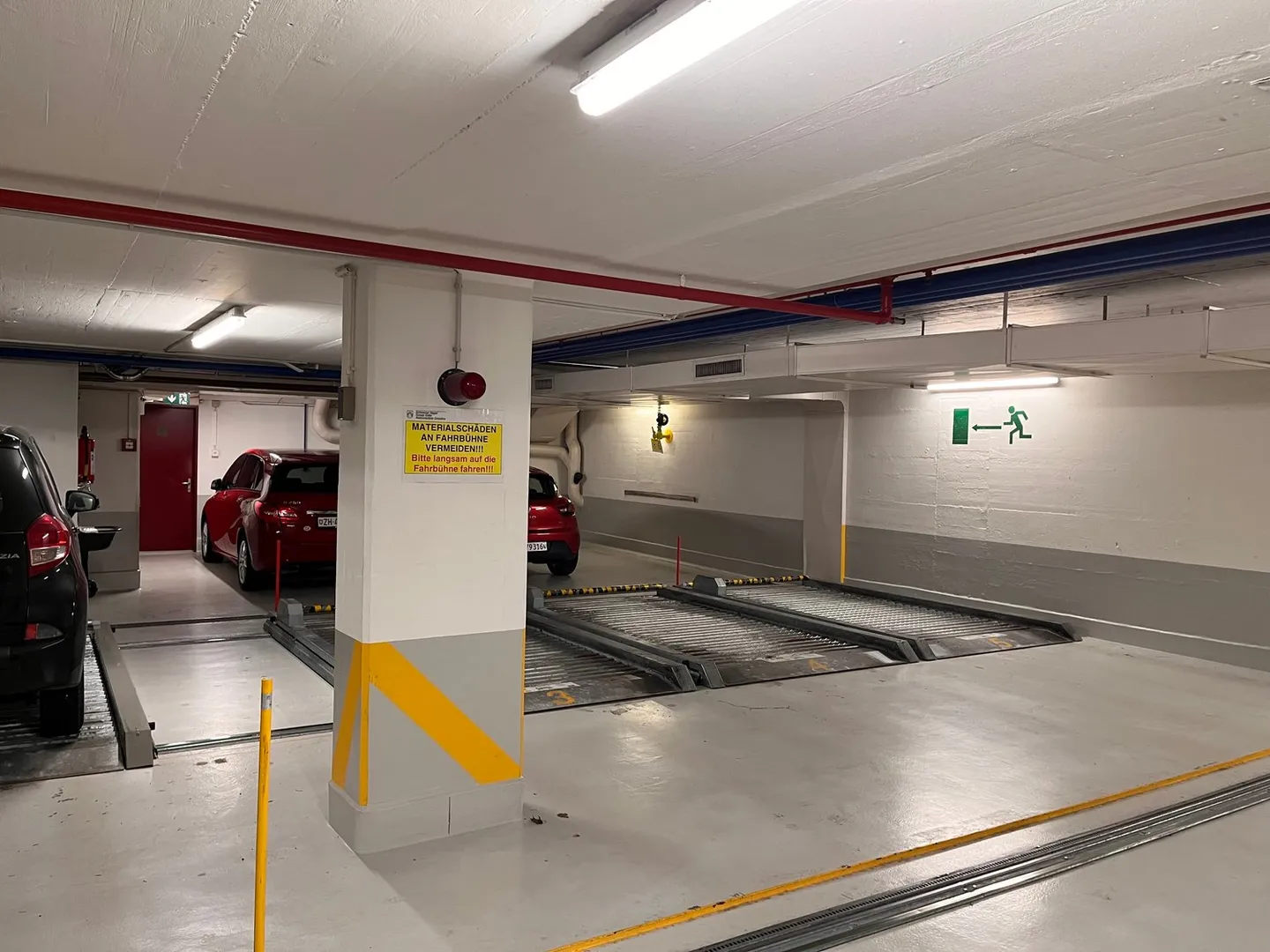 Place de parking à louer dans la ville de Zurich (ascenseur) - Photo 1 sur 5