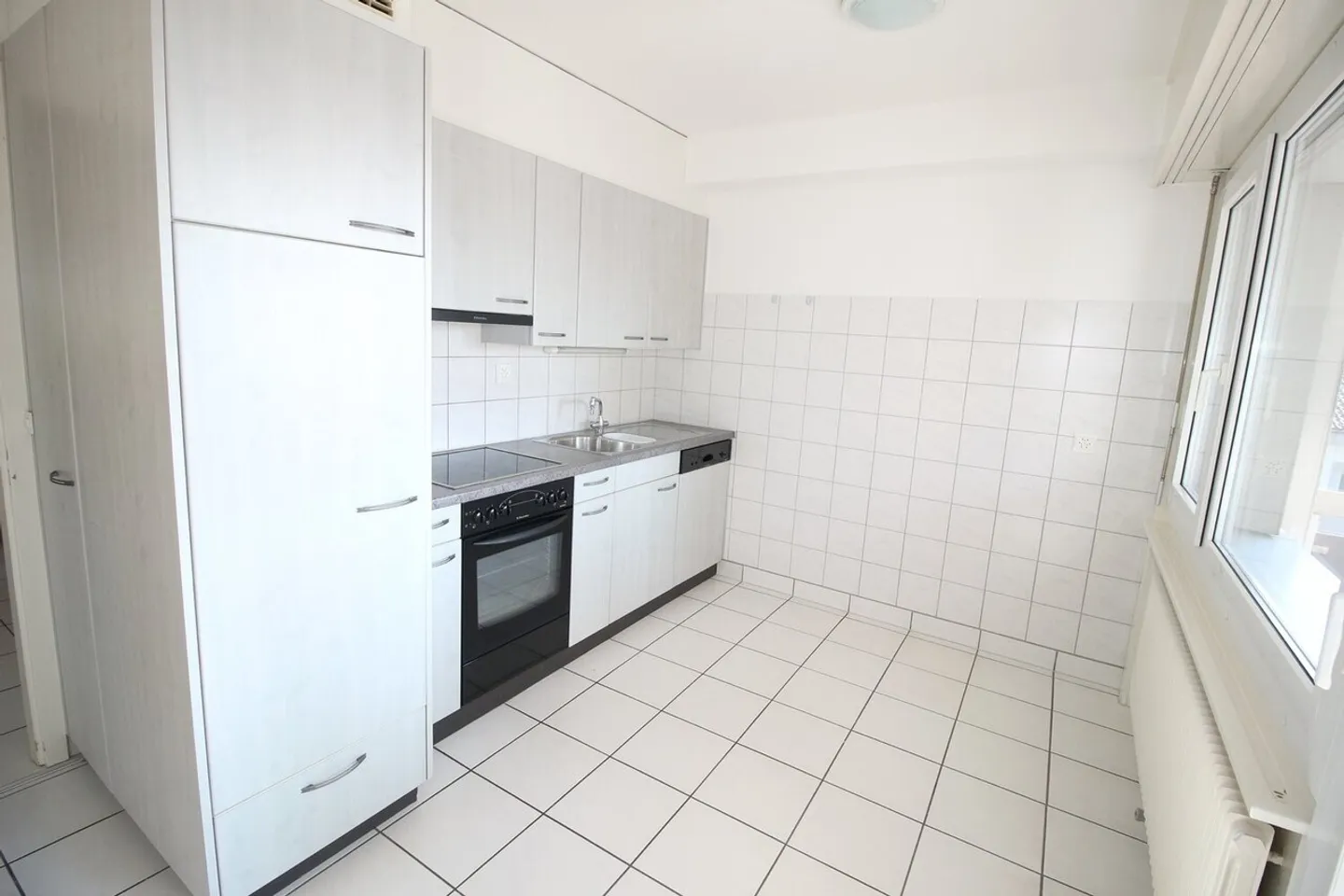 Appartement spacieux en cadre verdoyant - Photo 4 sur 13