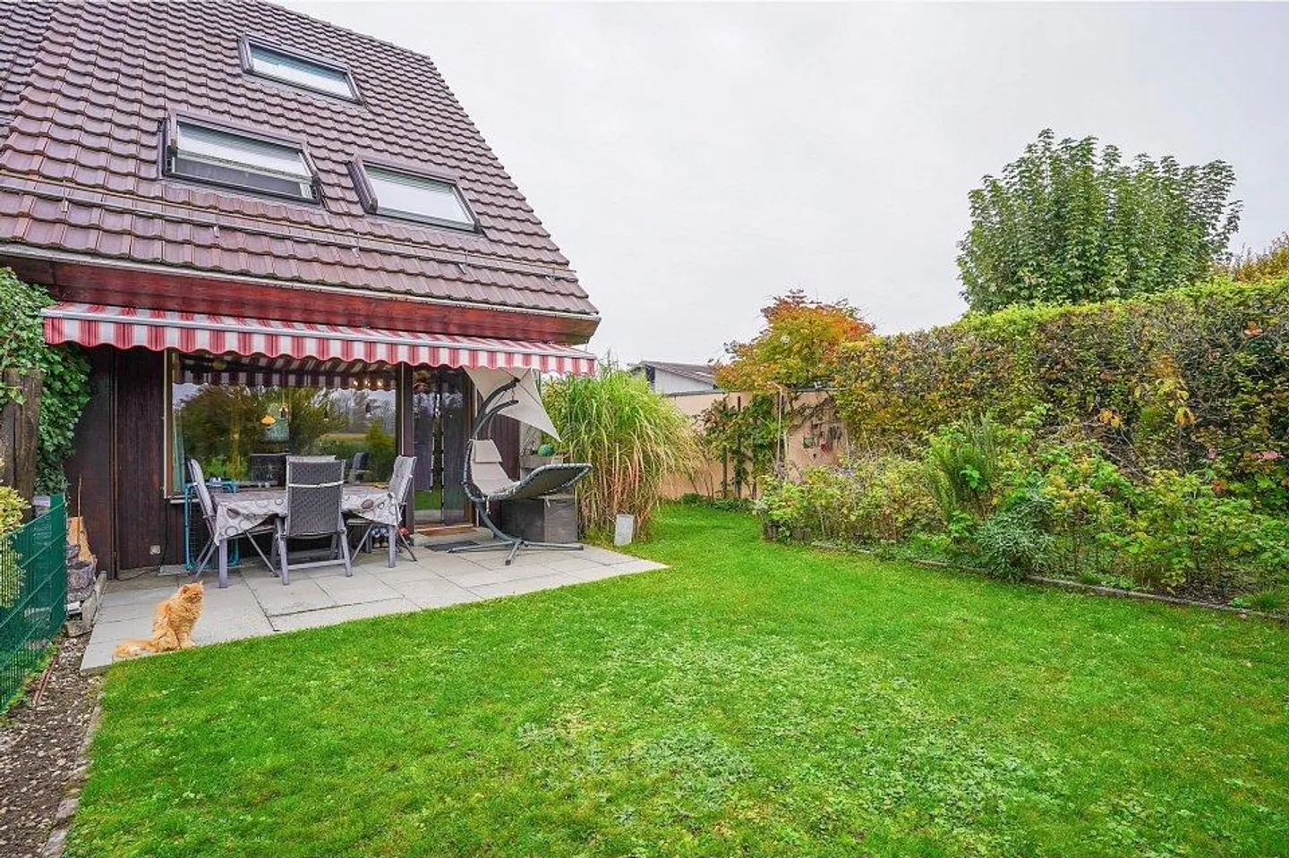 Casa a schiera angolare 4½ locali con giardino, garage e parco giochi - Foto 1 di 13