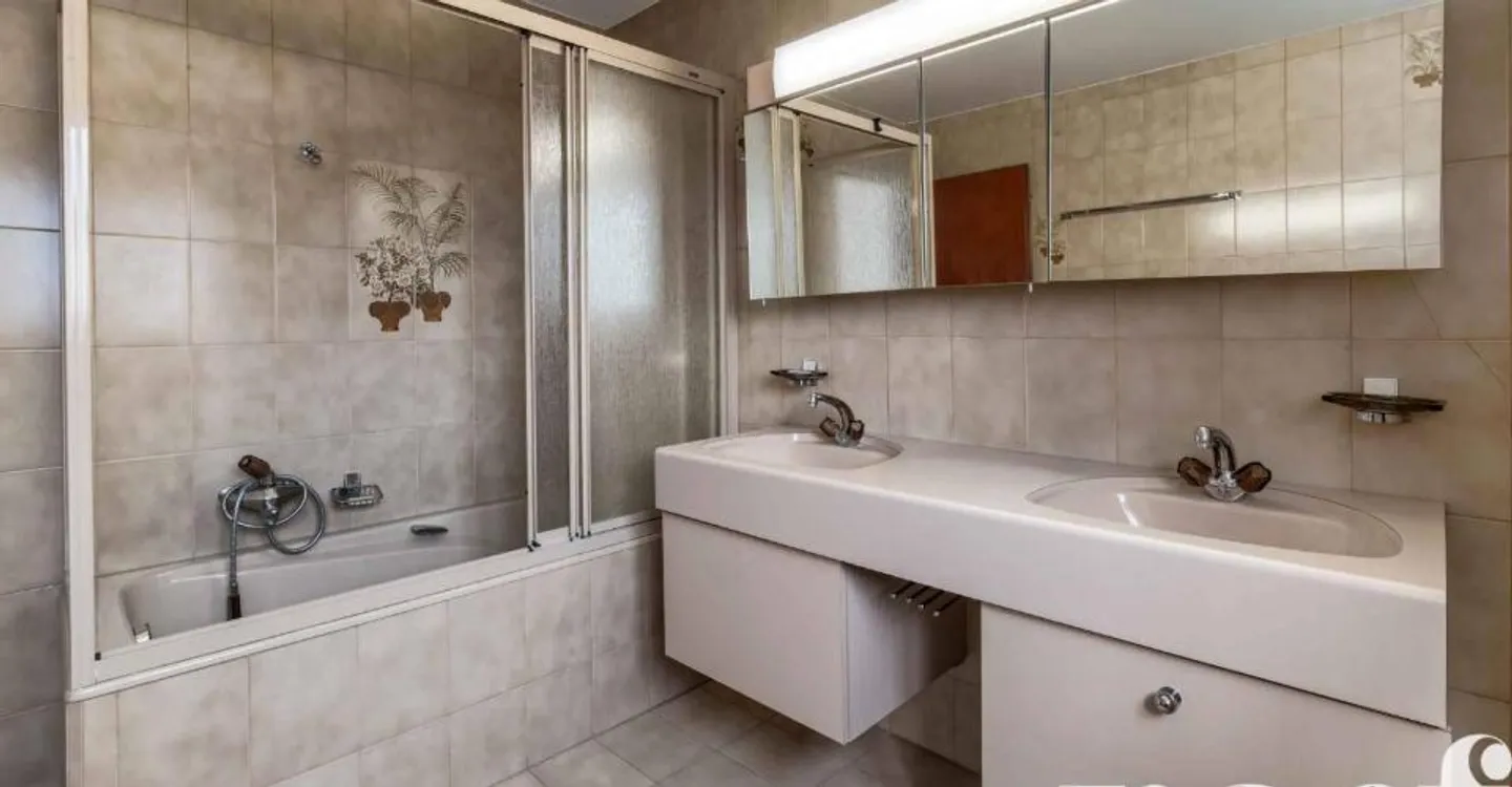 Superbe Appartement avec Vue sur le Lac - Photo 10 sur 12