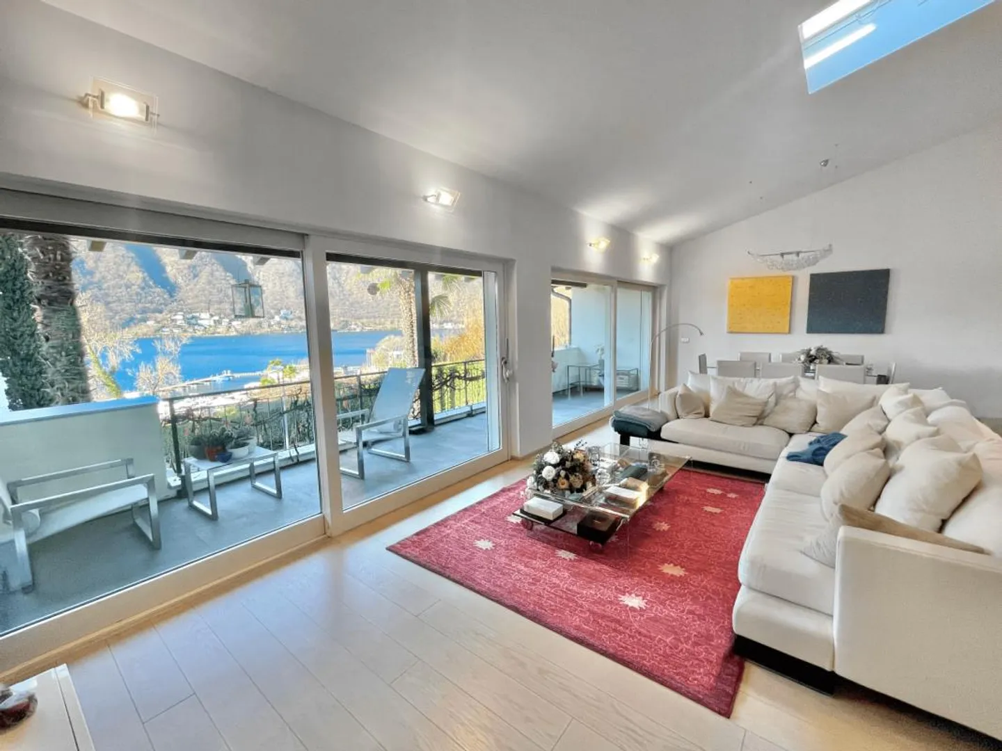 Morcote: Elegante attico anche 2° residenza con vista sul lago di Lugano, 2,5 locali - Foto 1 di 12