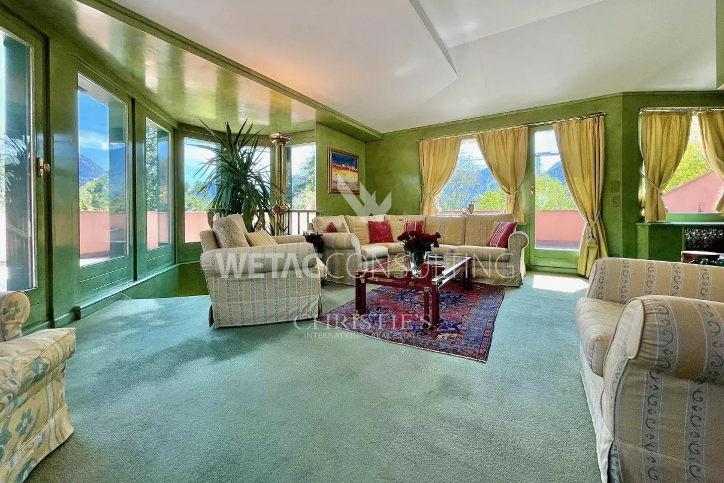 Appartamento duplex in attico nel verde con vista parziale sul lago - Foto 3 di 10