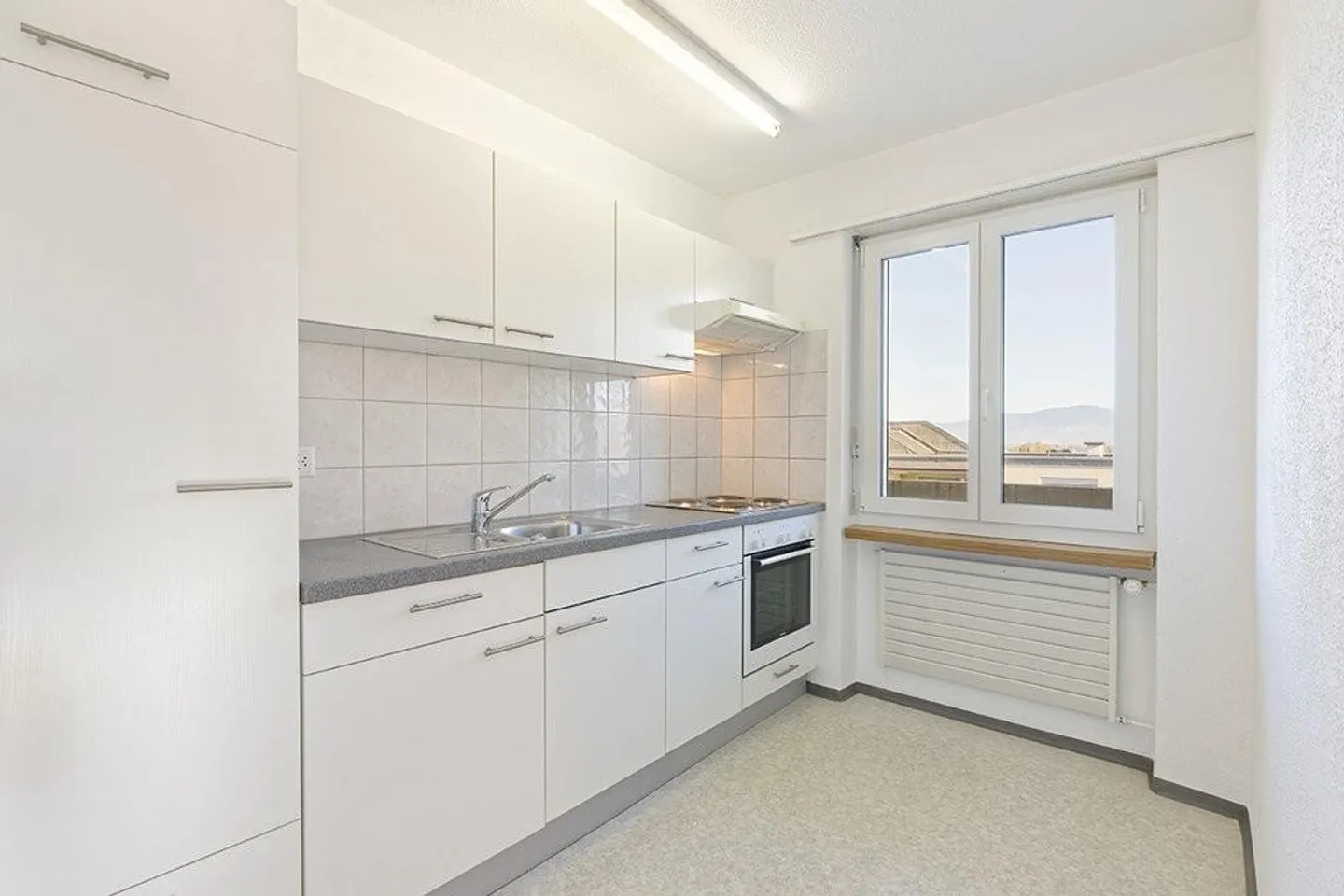 Vue sur le vert dans un quartier familial - Photo 2 sur 11