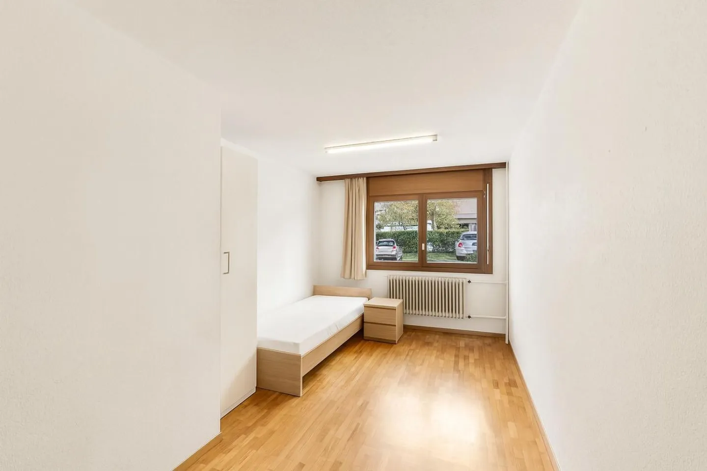 Spacious 4.5-room garden-level apartment - Photo 9 of 12