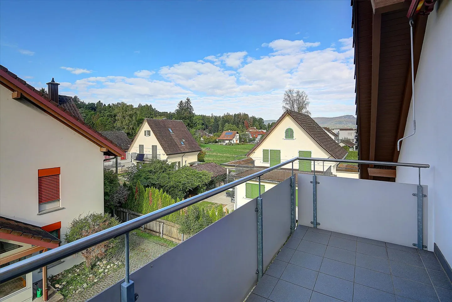 Charmante Dachwohnung mit Cheminée - Foto 11 von 11