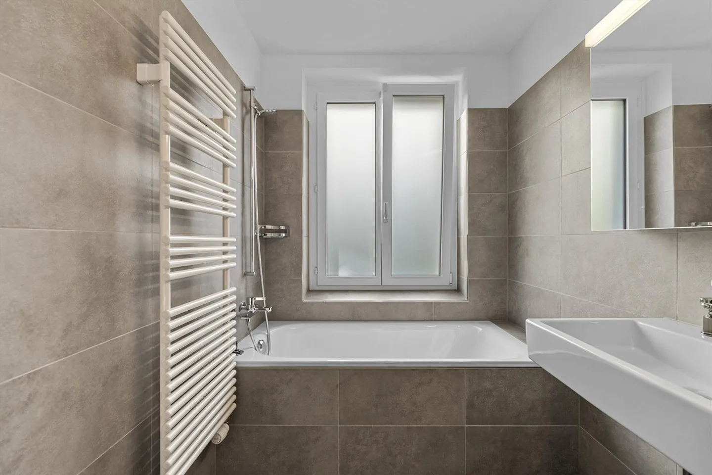 Symbiosis of Old Building and Modern in the Obergütsch Quarter - Photo 3 of 9