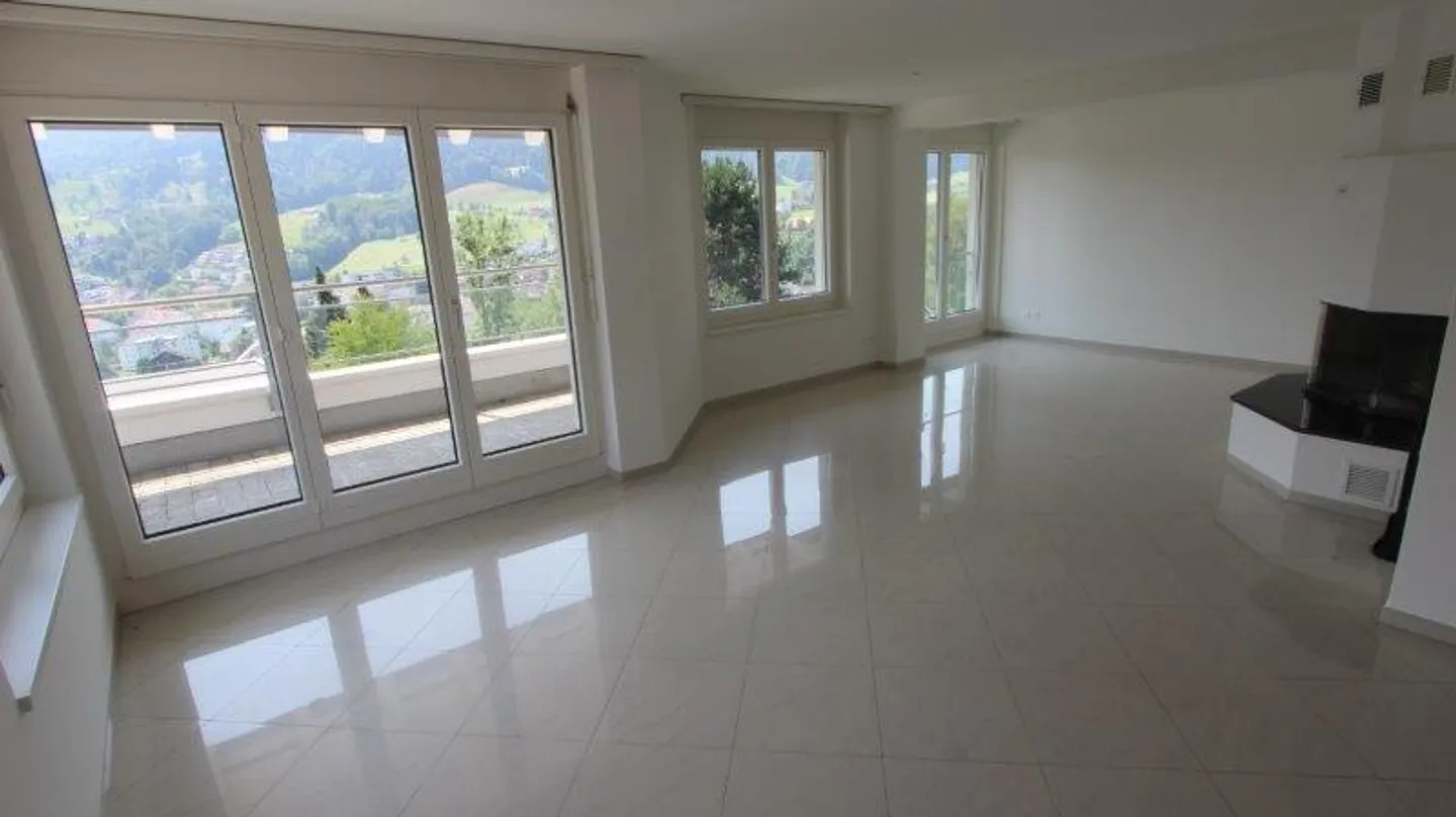 Spacious 5-room maisonette apartment with fireplace and direct view of the Pilatus - Photo 7 of 13