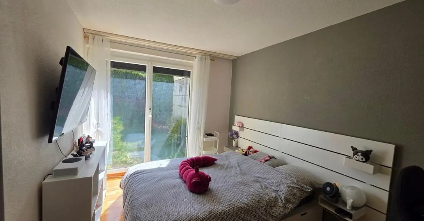 4-room apartment with private garden and garage-box - Photo 8 of 9