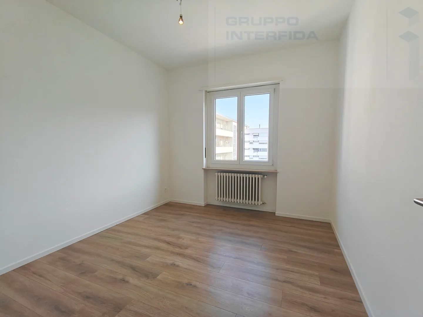CHIASSO - SPACIOUS 5.5 ROOM APARTMENT - Photo 6 of 7