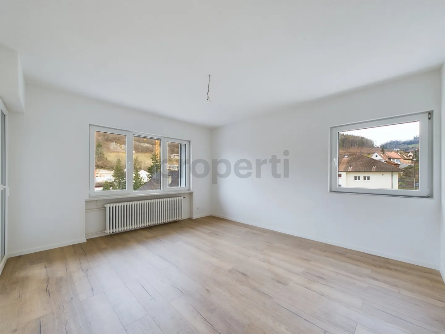 Stillvolle und renovierte 4.5-Zimmer Wohnung in Waldenburg - Foto 1 von 9