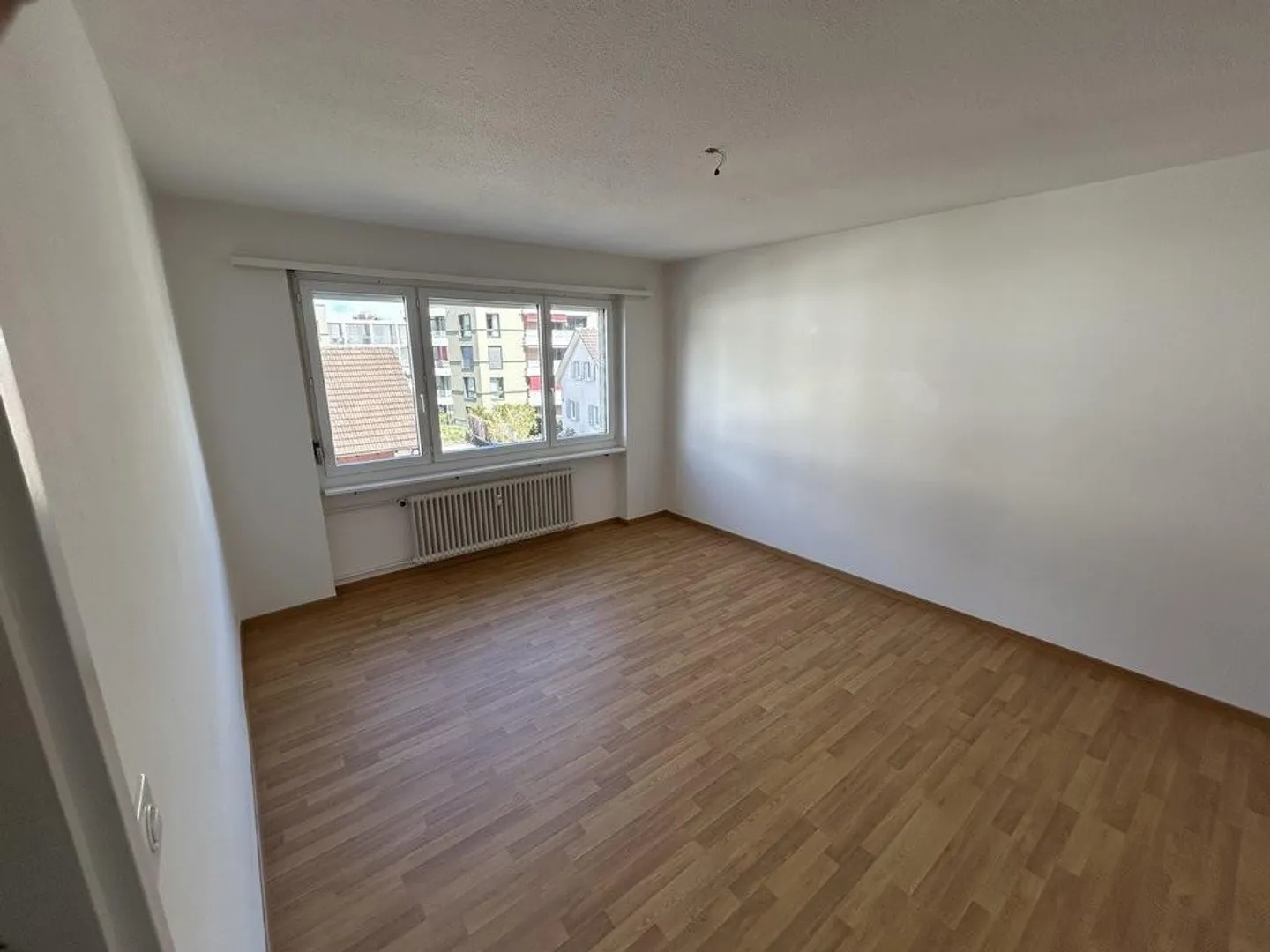 Spacious Family Apartment at a Great Price! - Photo 4 of 7