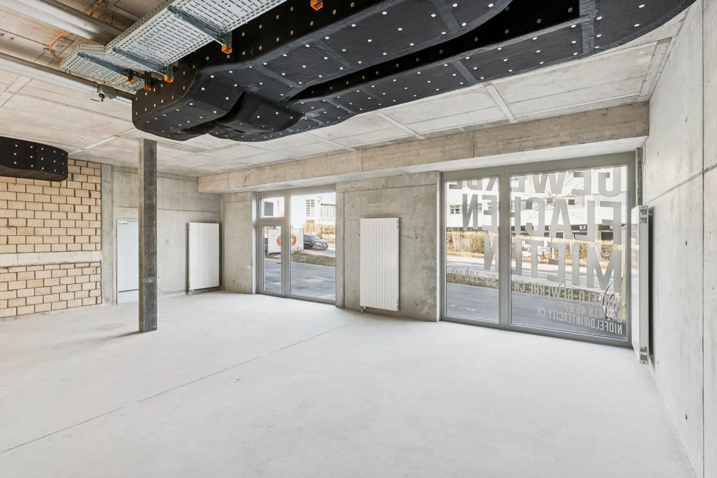 Partially developed commercial spaces in an emerging district - Photo 2 of 3