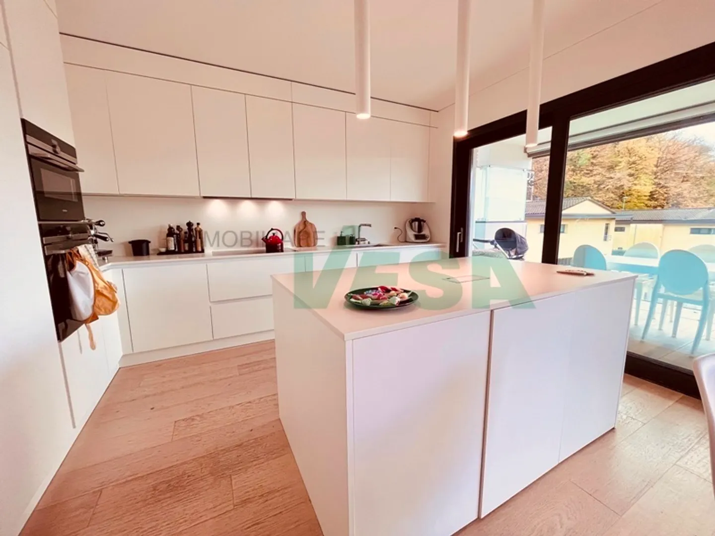 Modernes 4,5-Zimmer-Apartment mit schöner Terrasse und privatem Garten - Foto 12 von 13