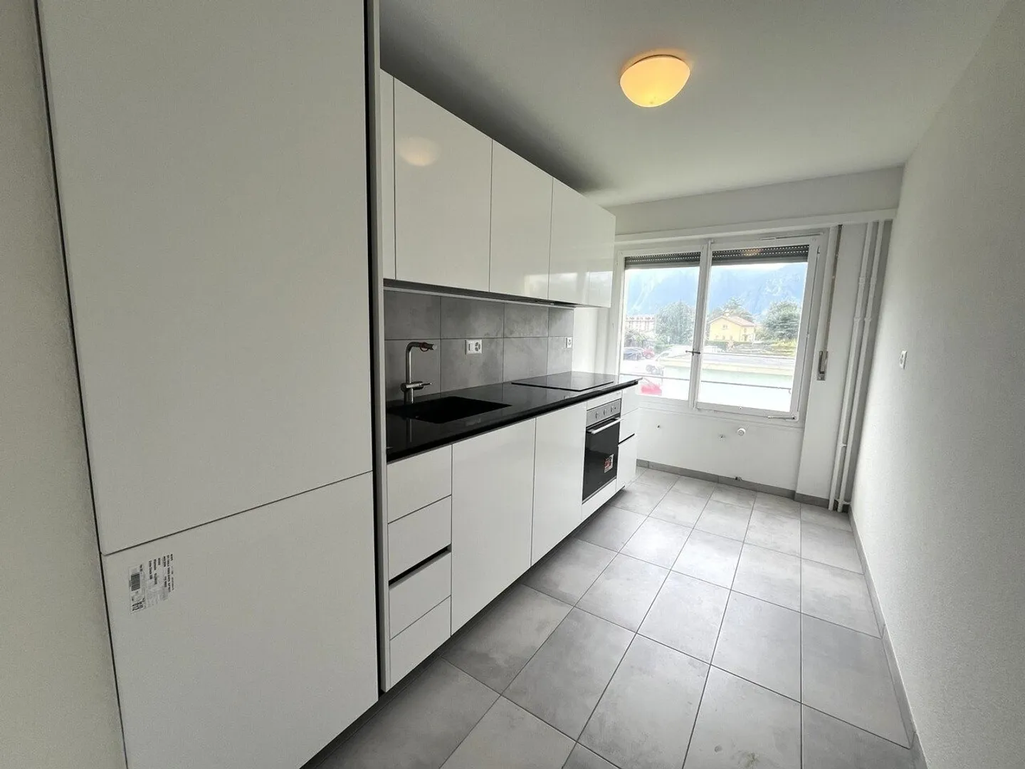 Beautiful 3.5-room apartment on the 1st floor in Villeneuve - Photo 5 of 7