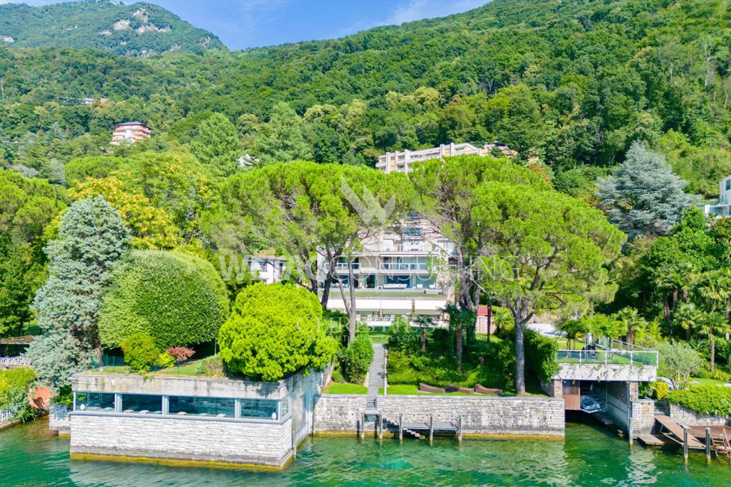 Direttamente sull'acqua a Lugano-Bissone: appartamento moderno in vendita - Foto 1 di 12