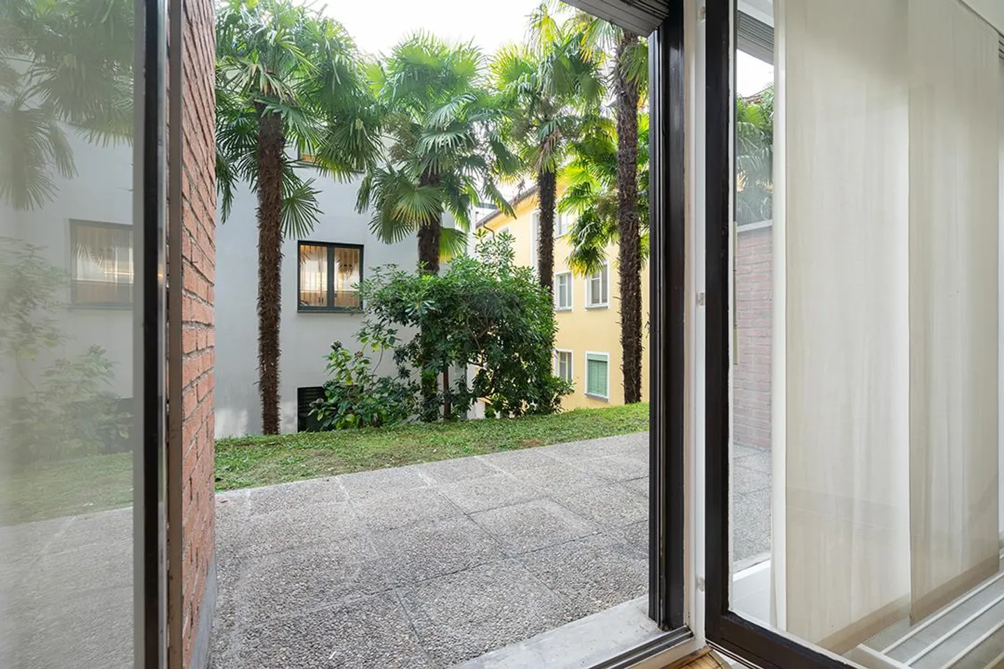 Luminoso duplex con giardino nel cuore della città - Foto 8 di 11