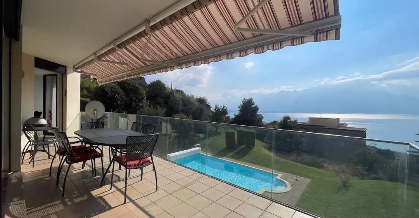 GRANDE APPARTAMENTO DI 5,5 LOCALI CON I COMFORT DI UNA VILLA E UNA BELLA VISTA PANORAMICA - Foto 1 di 12