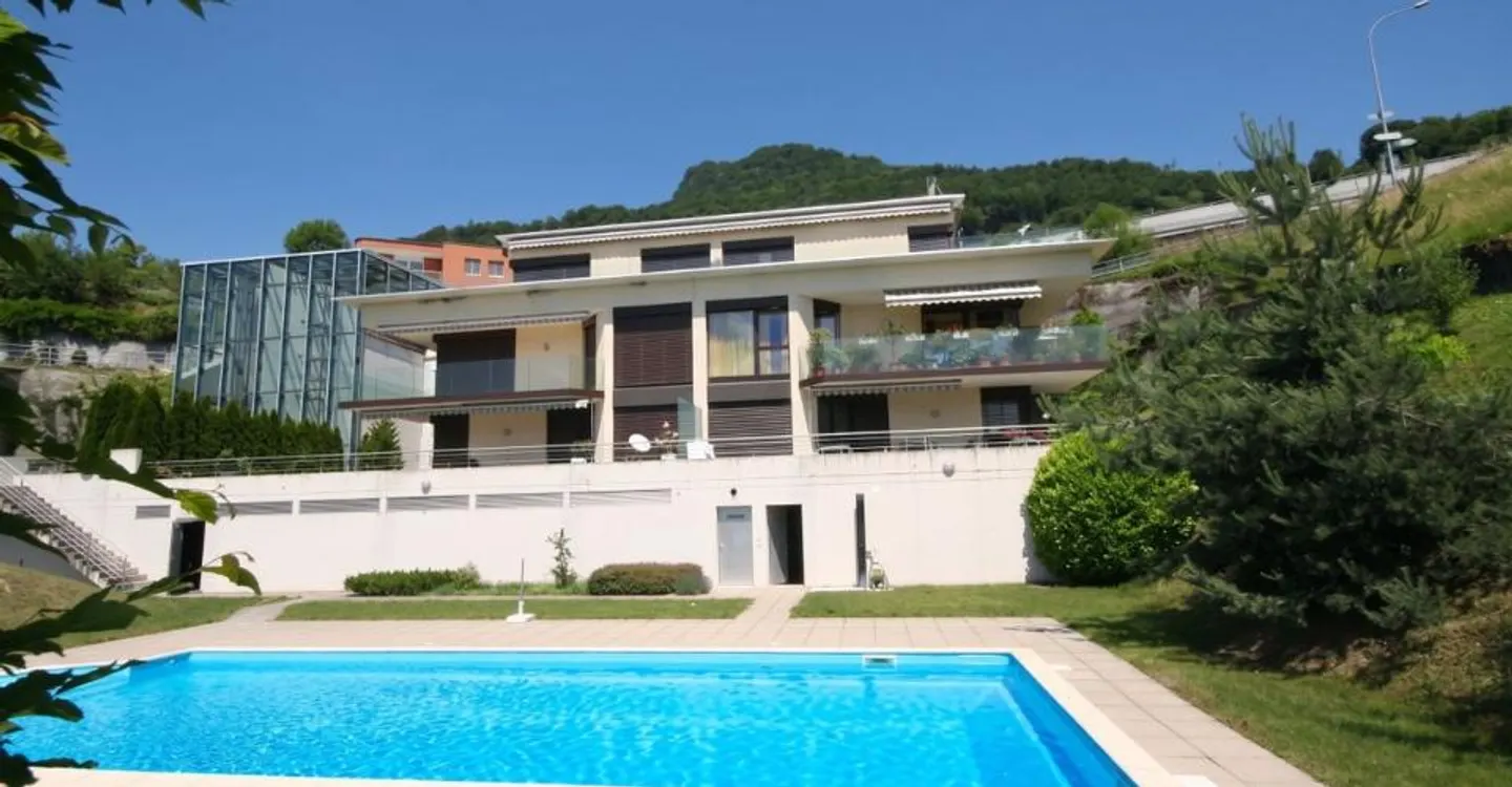 GRANDE APPARTAMENTO DI 5,5 LOCALI CON I COMFORT DI UNA VILLA E UNA BELLA VISTA PANORAMICA - Foto 4 di 12