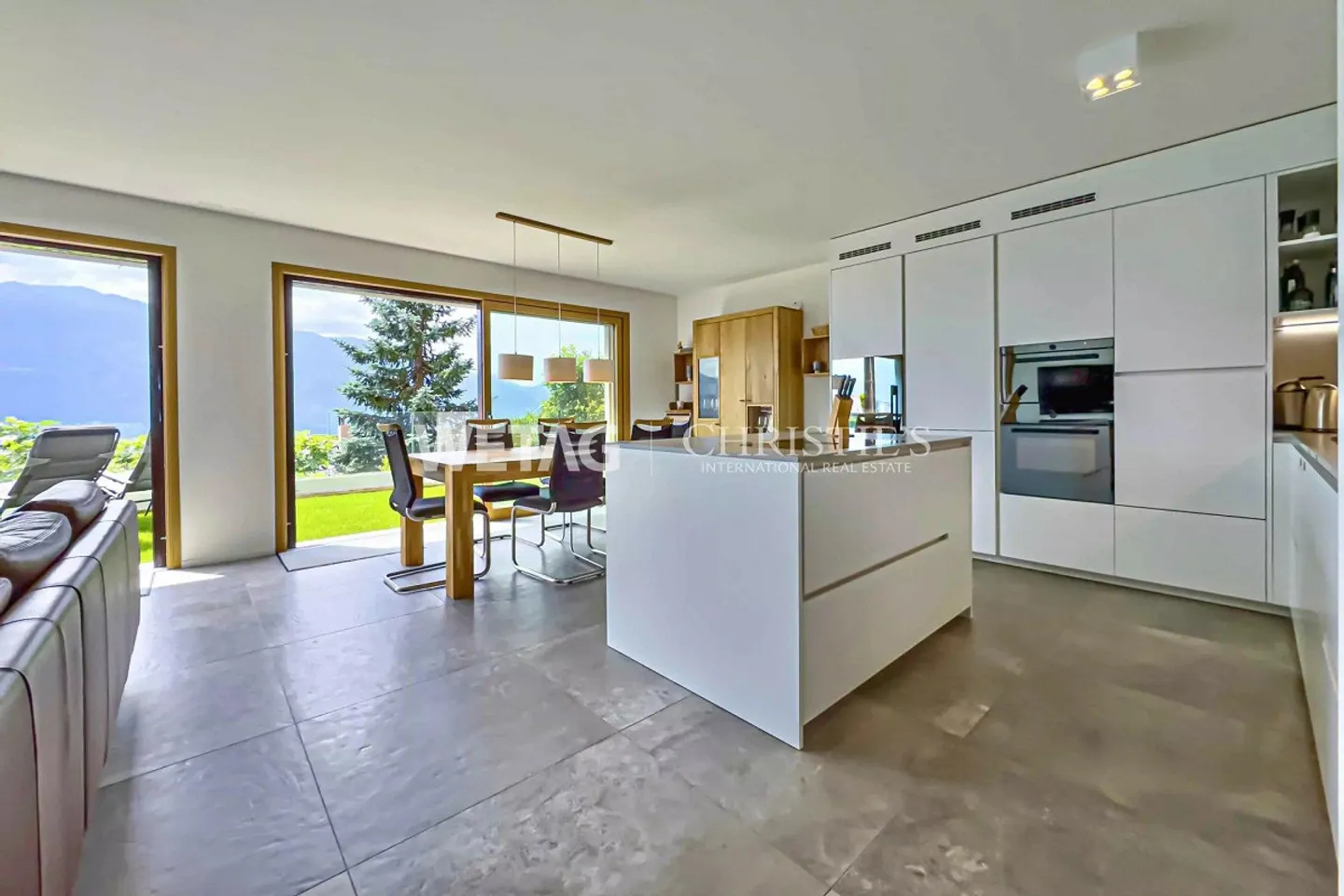 Moderne Wohnung mit Garten und Seeblick - Foto 3 von 13