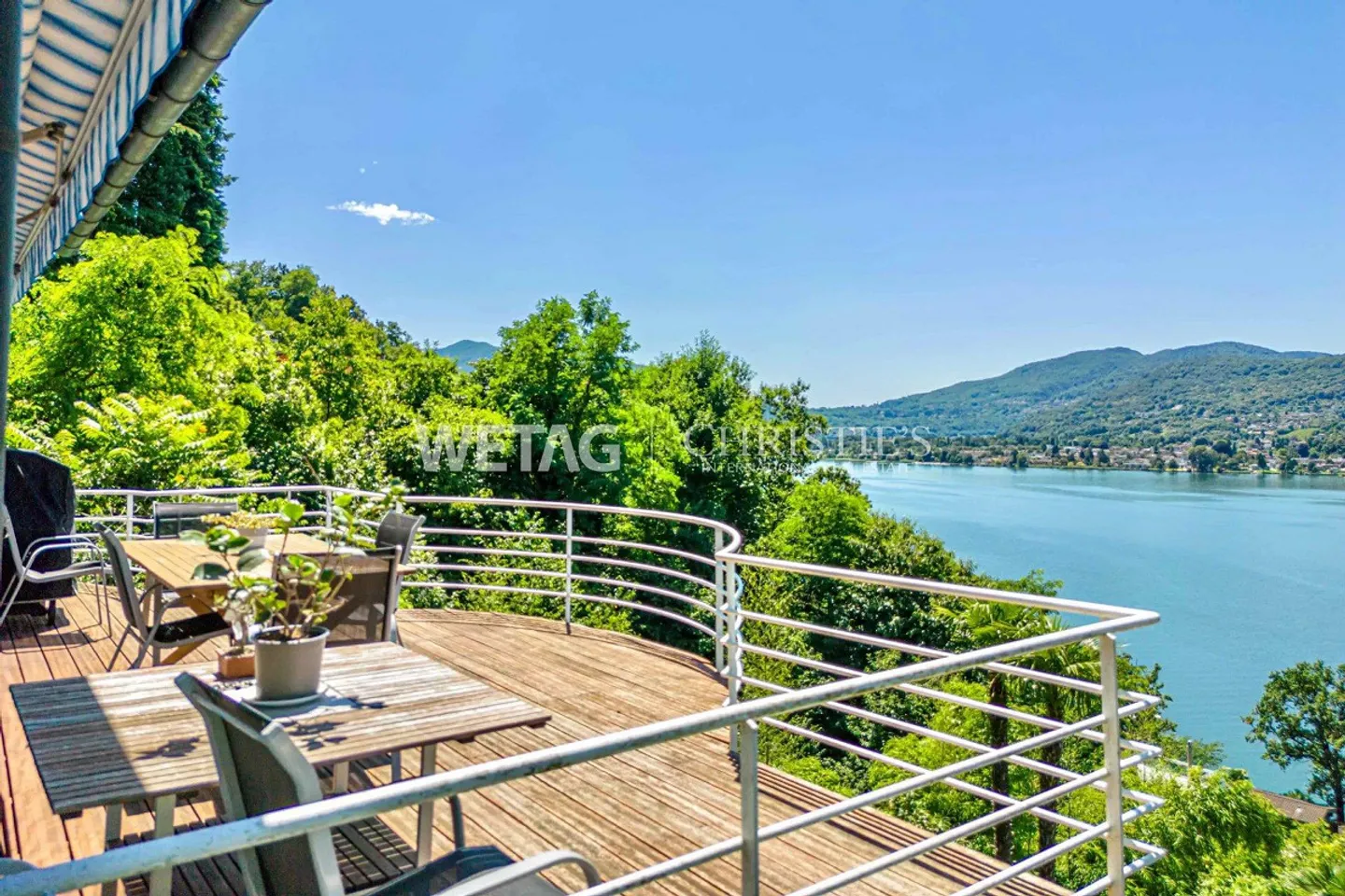 Charming small villa with outdoor pool, lake view in Montagnola for sale - Photo 1 of 13