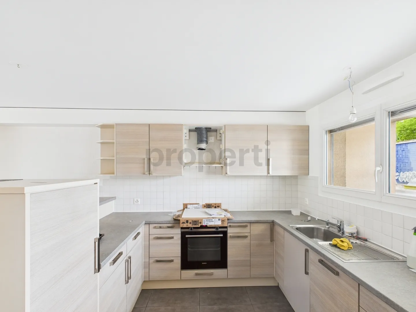 Wunderschönes Duplex mit privatem Garten in einem lebhaften Wohnviertel - Foto 5 von 13