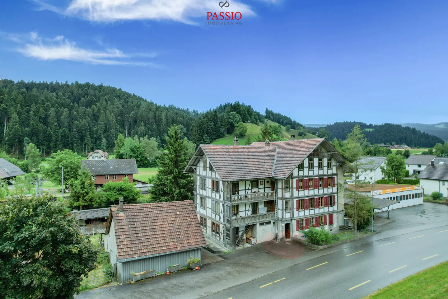 Profitable multi-family house with 4 horse boxes and development potential - Photo 1 of 31