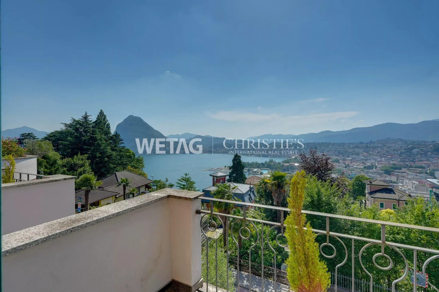 Lugano-Ruvigliana: appartamento elegante con vista mozzafiato sul lago, piscina e giardino in vendita - Foto 2 di 12
