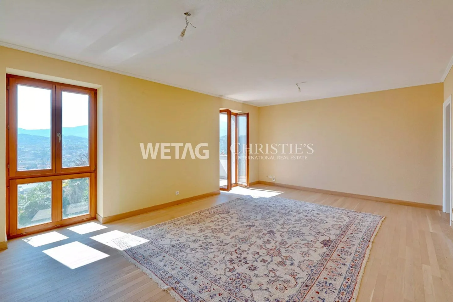 Lugano-Ruvigliana: appartamento elegante con vista mozzafiato sul lago, piscina e giardino in vendita - Foto 3 di 12