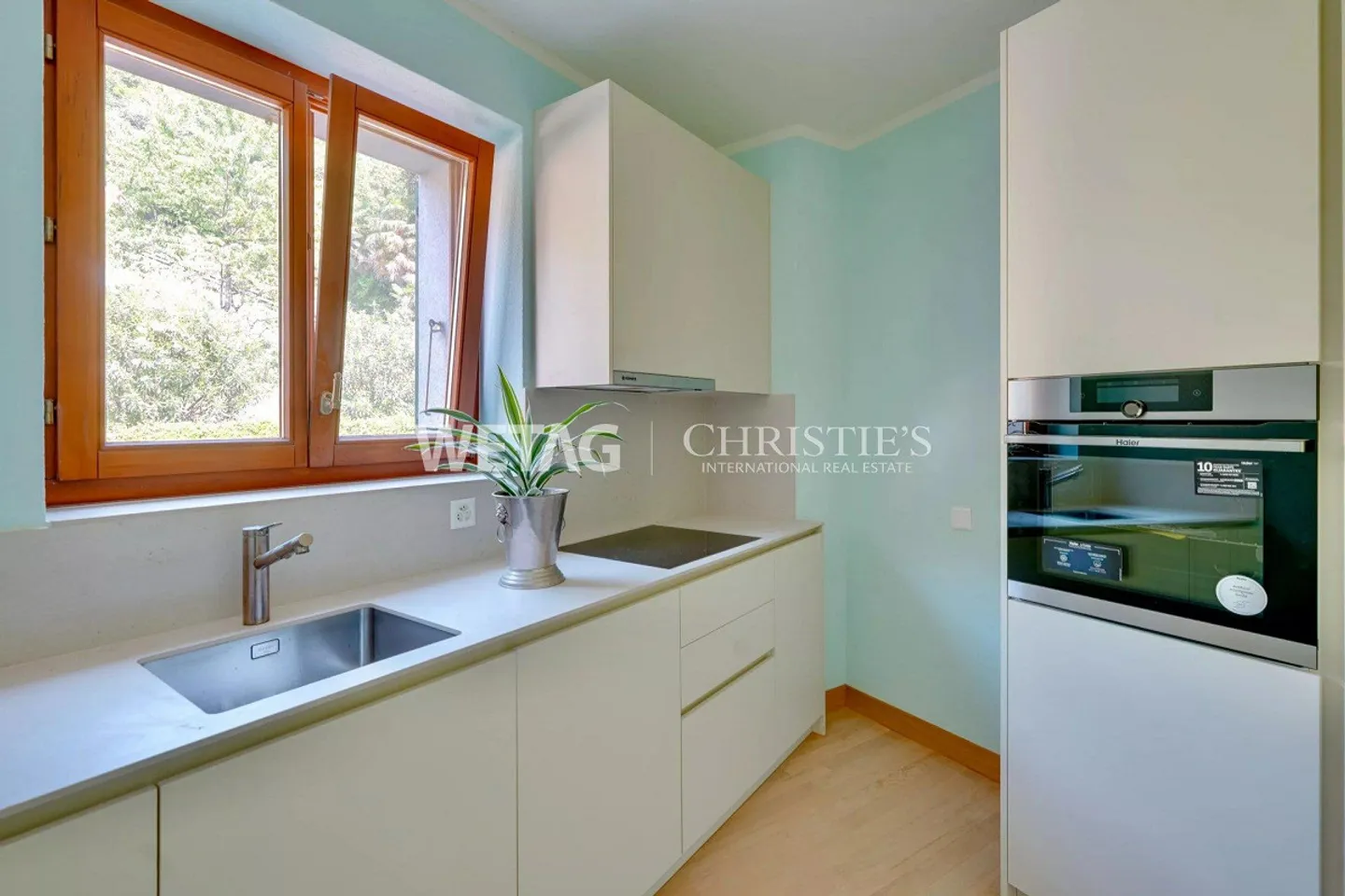 Lugano-Ruvigliana: appartamento elegante con vista mozzafiato sul lago, piscina e giardino in vendita - Foto 5 di 12