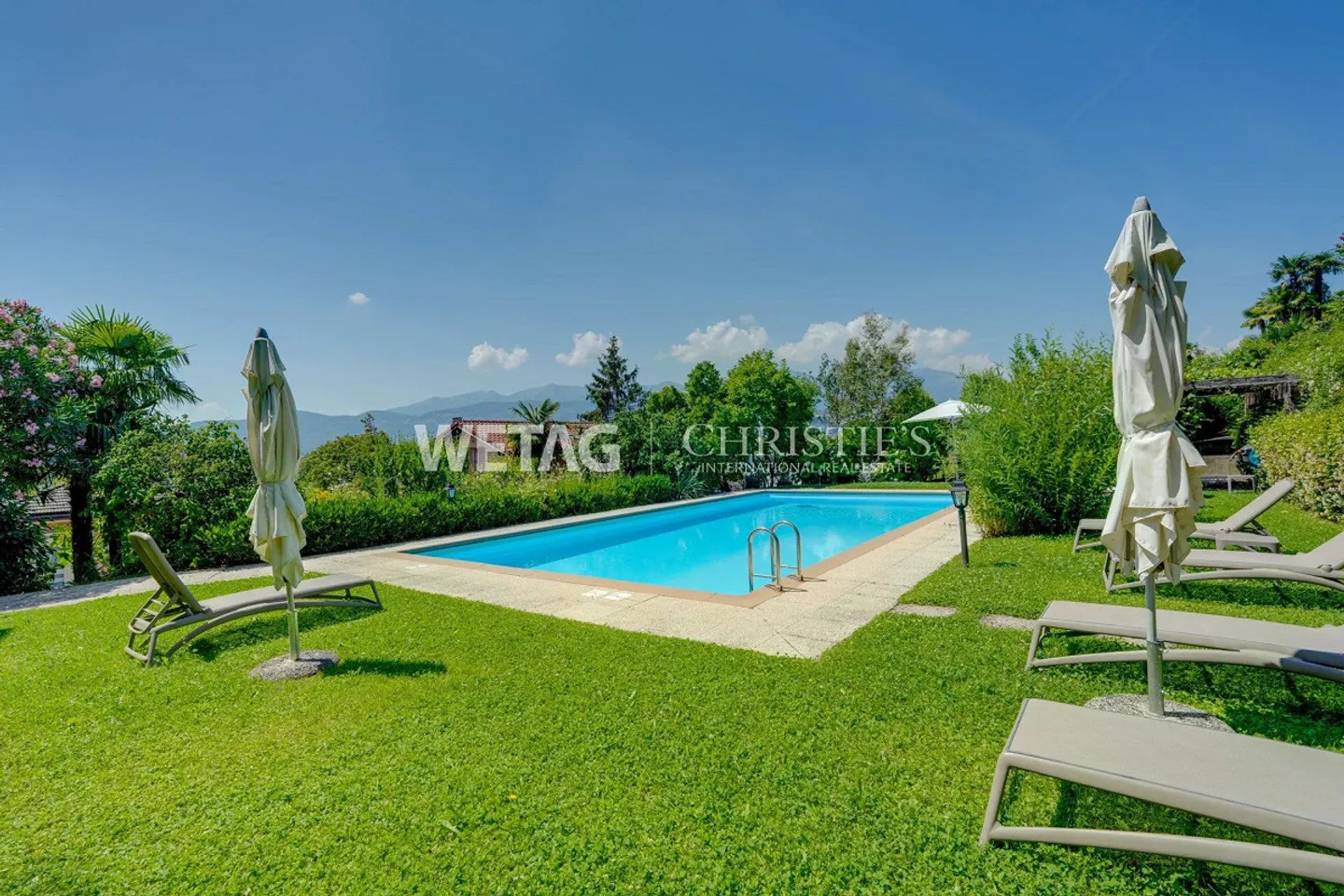Lugano-Ruvigliana: appartamento elegante con vista mozzafiato sul lago, piscina e giardino in vendita - Foto 6 di 12