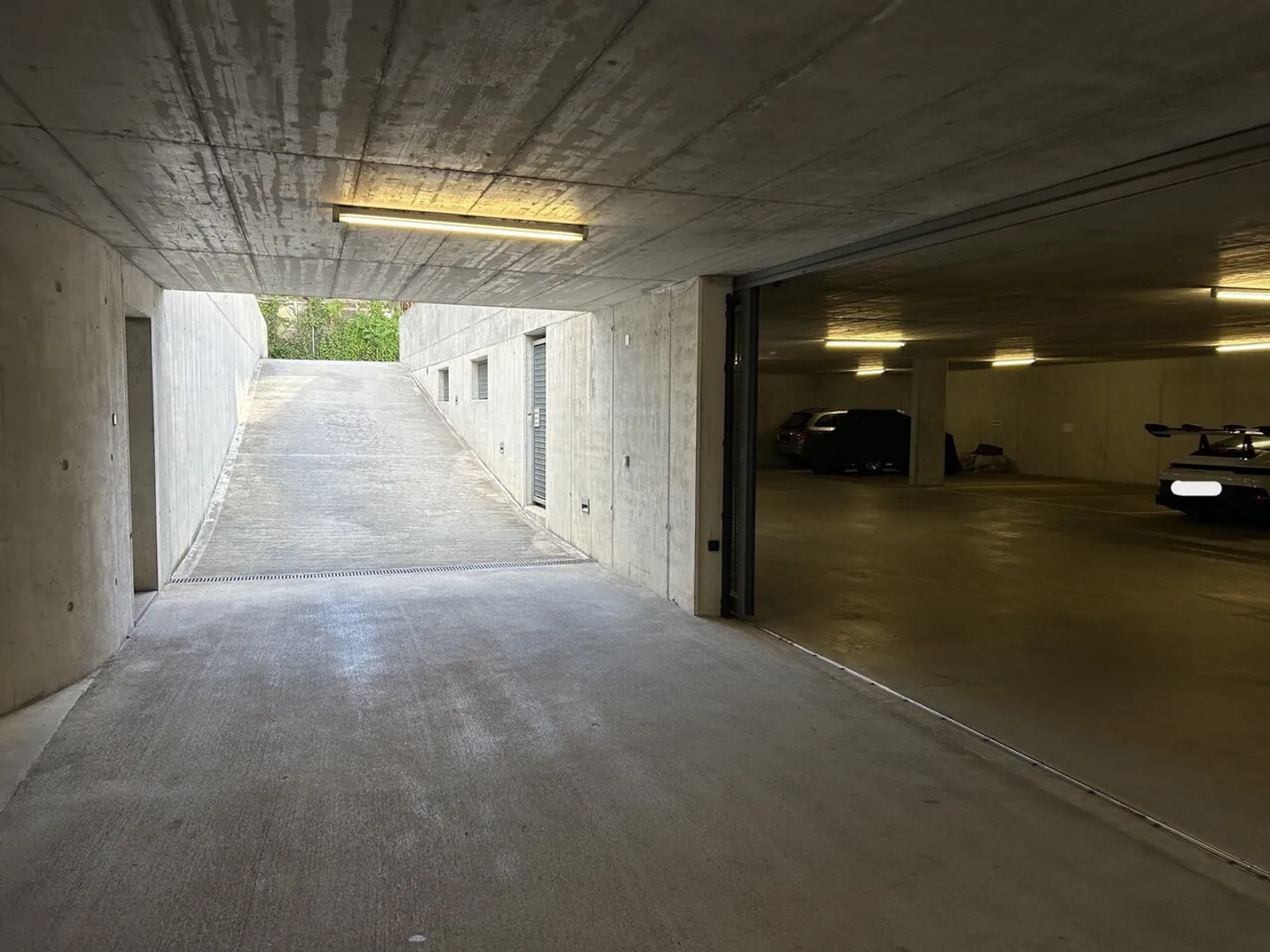 Parking space for rent in garage in Losone - Photo 5 of 6