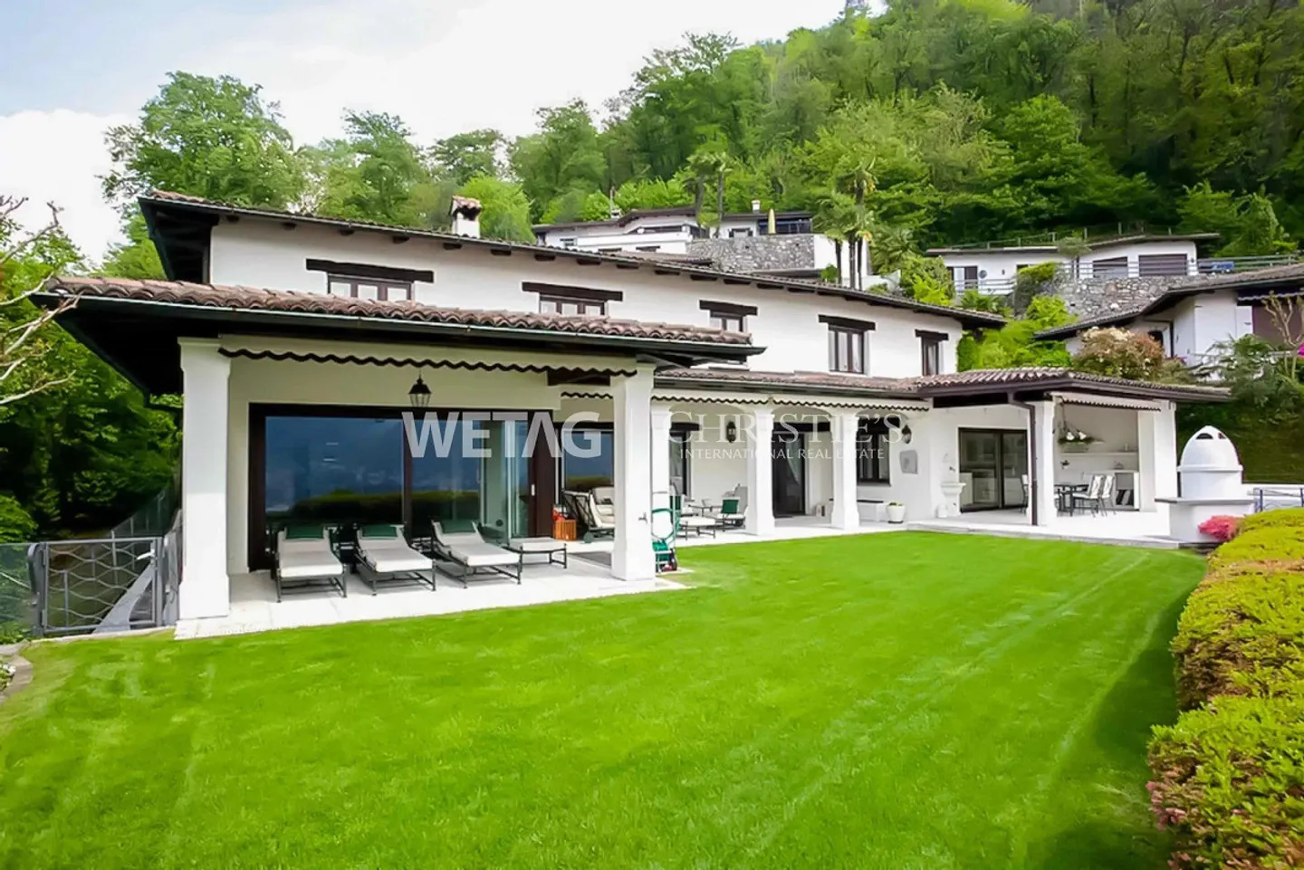 Lugano-Figino: Elegant villa with breathtaking views of Lake Lugano & indoor pool for sale - Photo 1 of 12