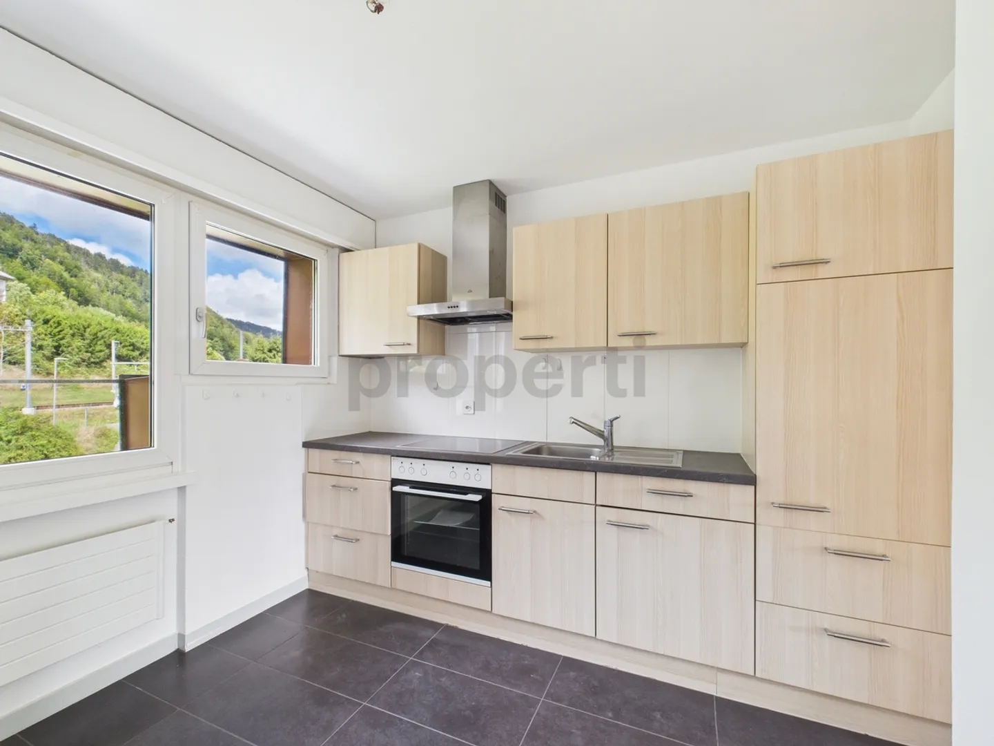 Appartement exclusif à Renan, BE - Un foyer harmonieux dans un cadr... - Photo 2 sur 7