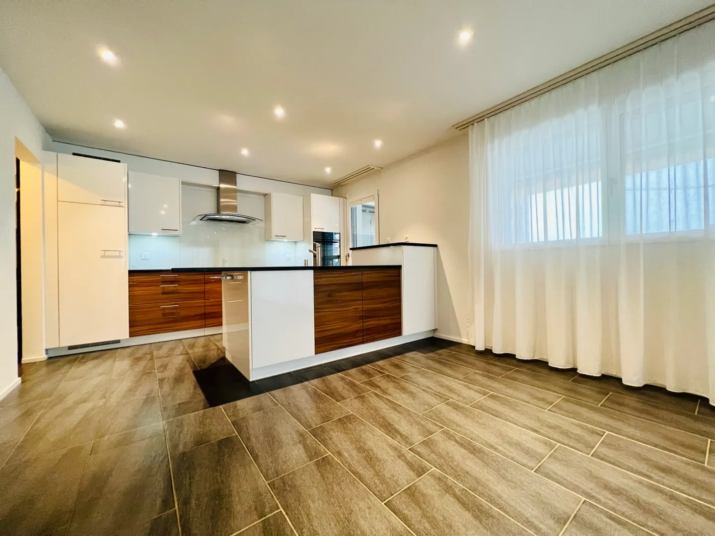 Spacious Family Home with Garden Seating Area and Living Comfort - Photo 1 of 9