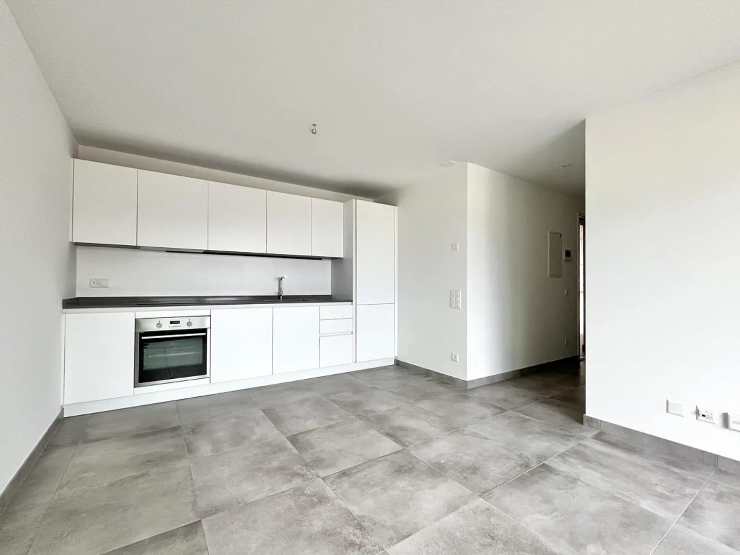 NEUES PENTHOUSE 2.5 ZIMMER MIT TERRASSE IN TESSERETE - Foto 4 von 9