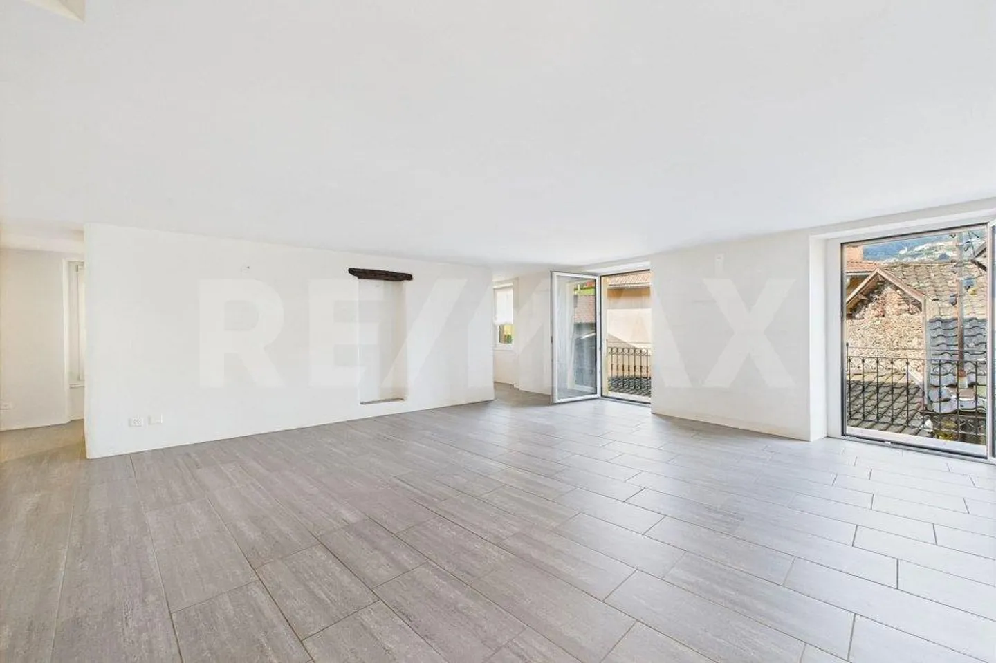 Appartamento affascinante di 2 ½ locali con 83 m² a Ponte Tresa – Ristrutturato con stile con terrazza panoramica - Foto 4 di 13