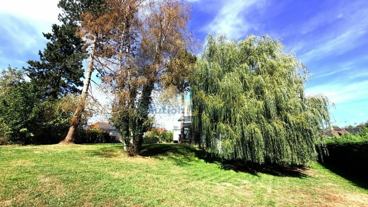 Charmantes Gebäude mit 3 Wohnungen und einem wunderschönen Garten - Foto 14 von 14