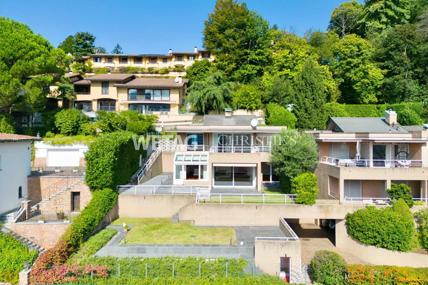 À Lugano : Élégante villa en rangée avec jardin privé et large vue sur le lac - Photo 2 sur 12