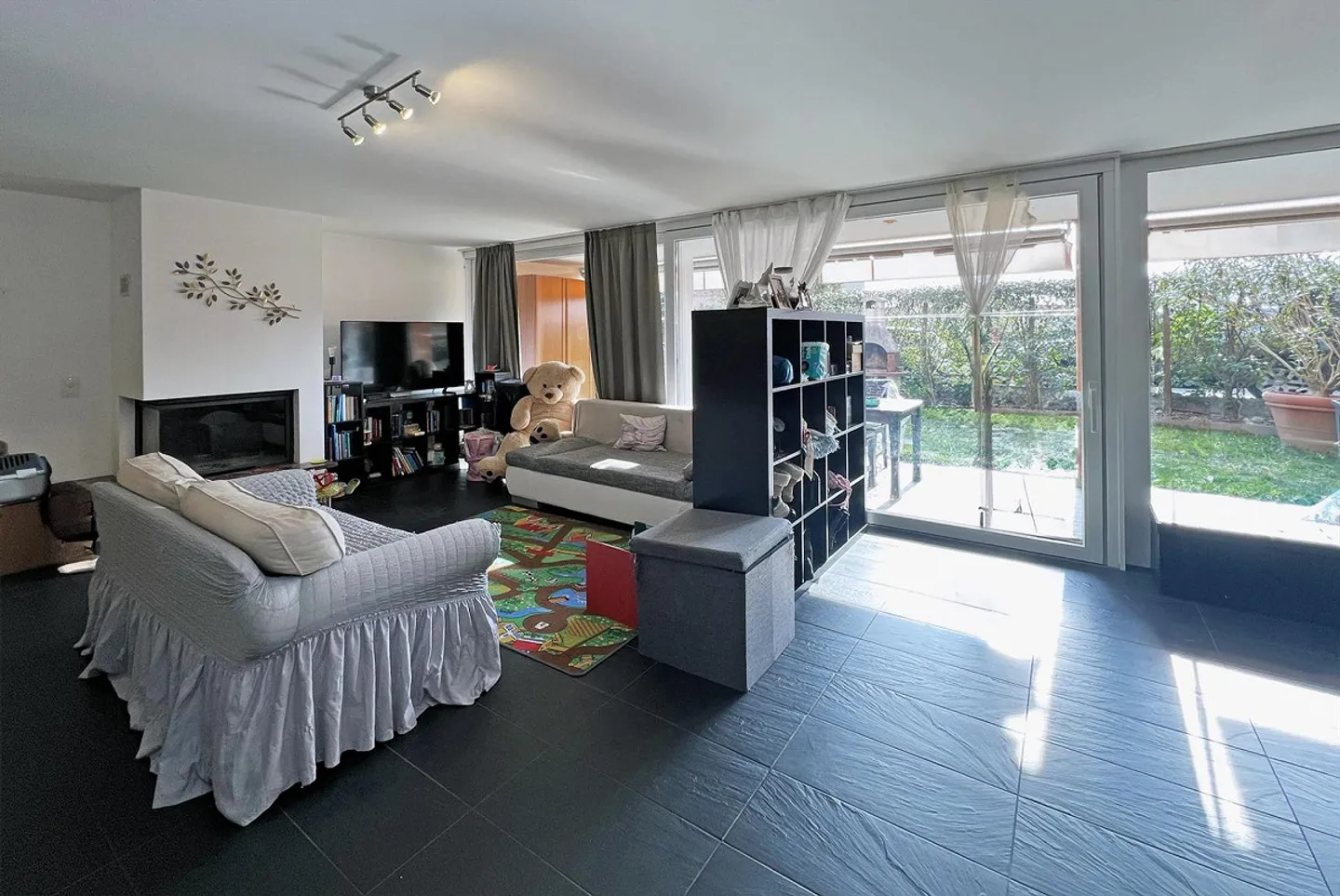 Geräumiges Duplex mit 3.5 Zimmern und privatem Garten in Agno - Foto 4 von 11