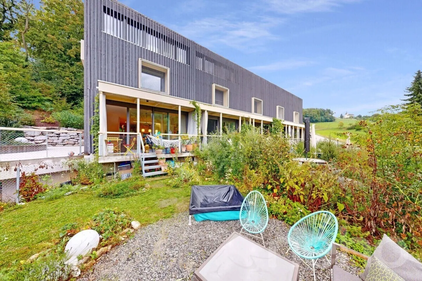 Bright and modern 5.5-room house in a quiet location of Bettingen - Photo 3 of 12