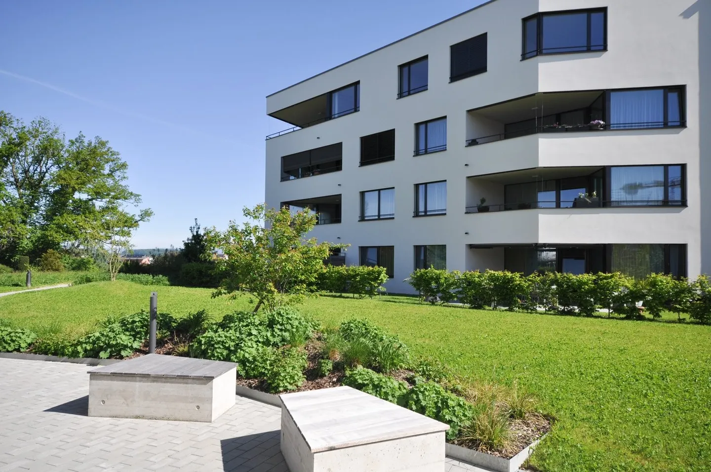 Appartement 3,5 pièces au rez-de-chaussée - Photo 1 sur 6