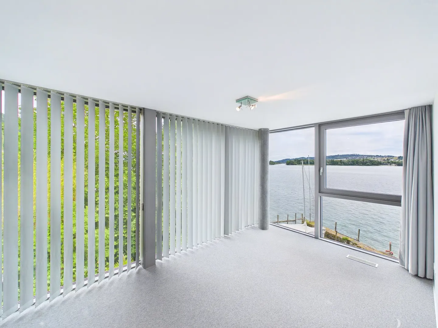 Exclusive Triplex Apartment with Direct Lake Access and Private Boat Dock - Photo 4 of 13