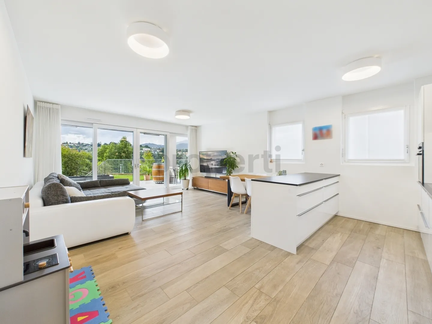 Élégance moderne avec jardin privé à Pazzallo - Photo 4 sur 13