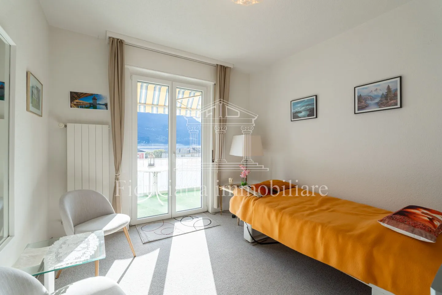 BRISSAGO - Appartamento spazioso in una posizione centrale e soleggiata con vista aperta sul lago - Foto 7 di 13